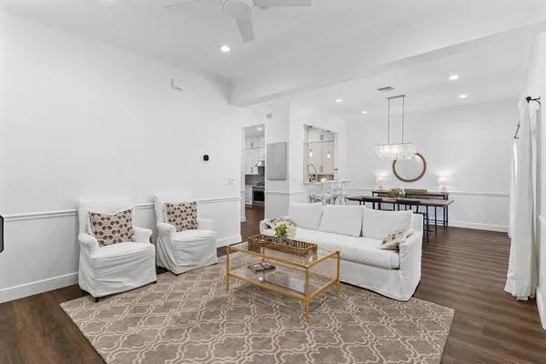 a bedroom with a bed and a table