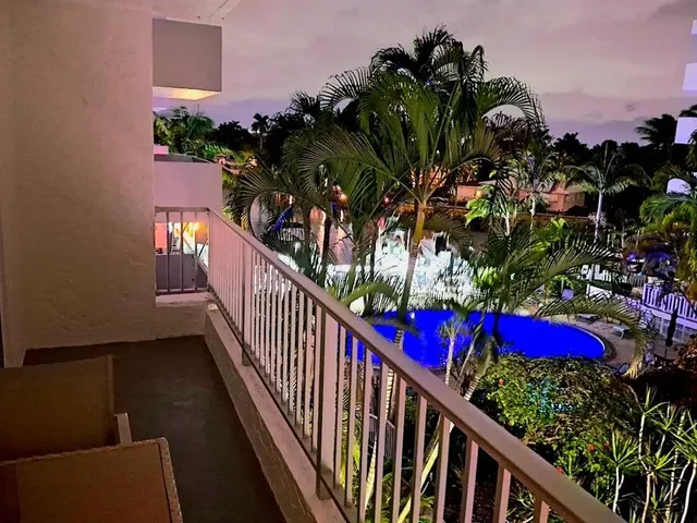 a view of a balcony with an outdoor space