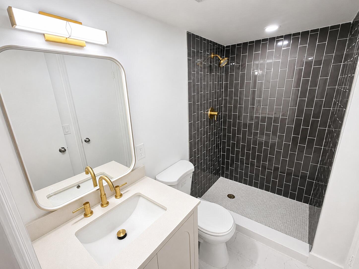 1505 North Riverside Drive, Unit 508 Pompano Beach, FL 33062 - Photo 13 of 31 2nd bathroom shower, vanity