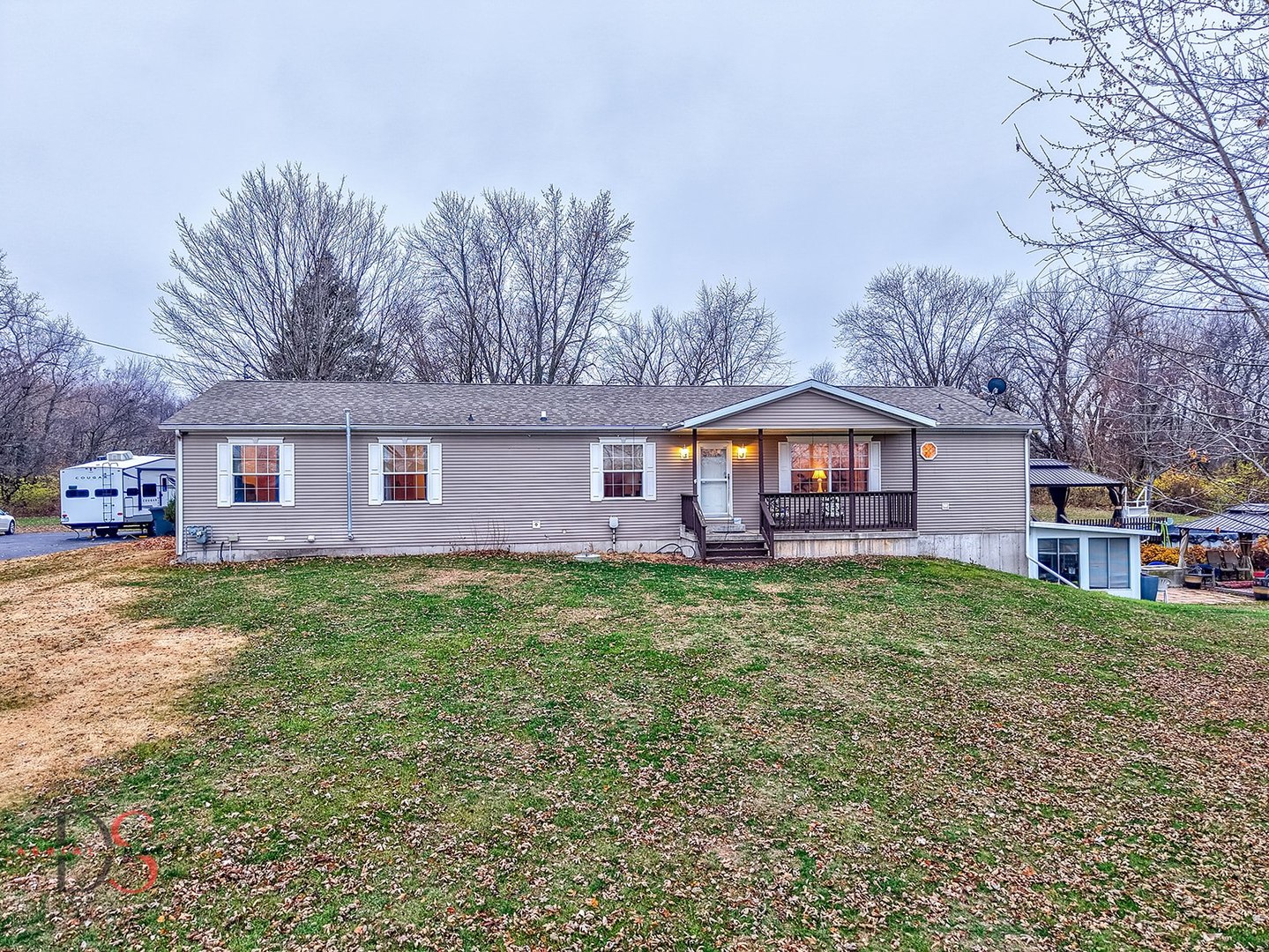 32415 North 600 E Road Streator, IL 61364 - Photo 2 of 44 a view of a yard in front of a house with large tree