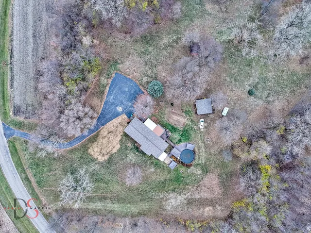 an aerial view of house with outdoor space