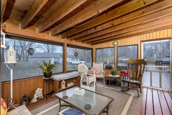 a living room filled with furniture and a table