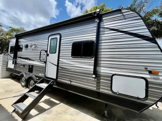 a view of a balcony with a large window