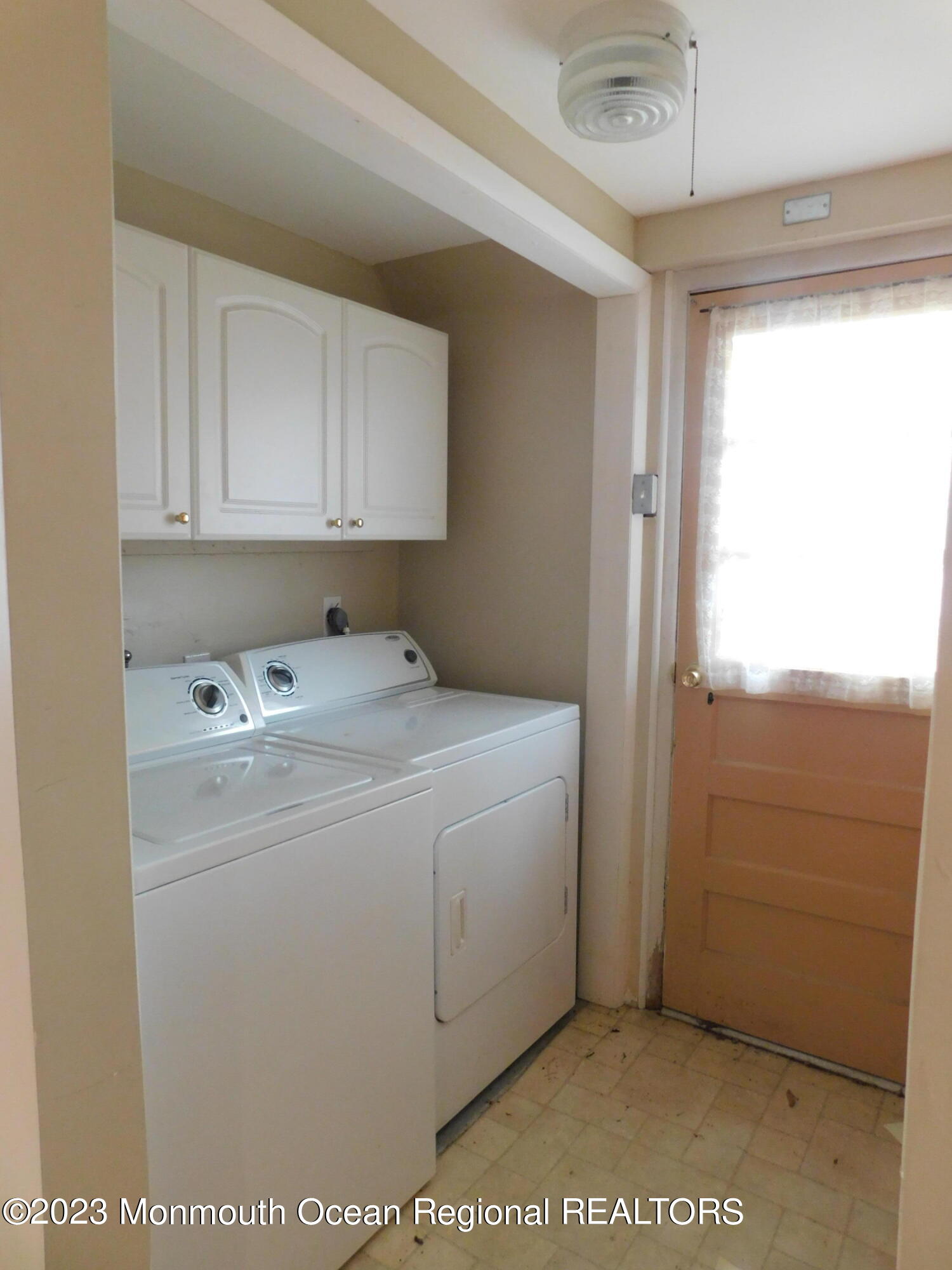 660 Pine Meadow Road Brick, NJ 08724 - Photo 19 of 67 a utility room with closet dryer and washer