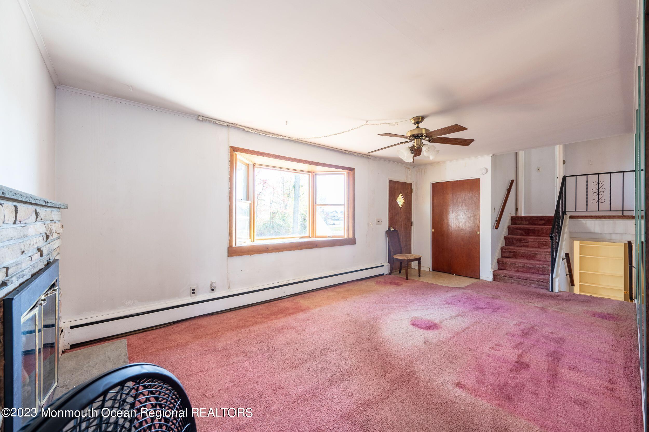 660 Pine Meadow Road Brick, NJ 08724 - Photo 23 of 67 an empty room with windows