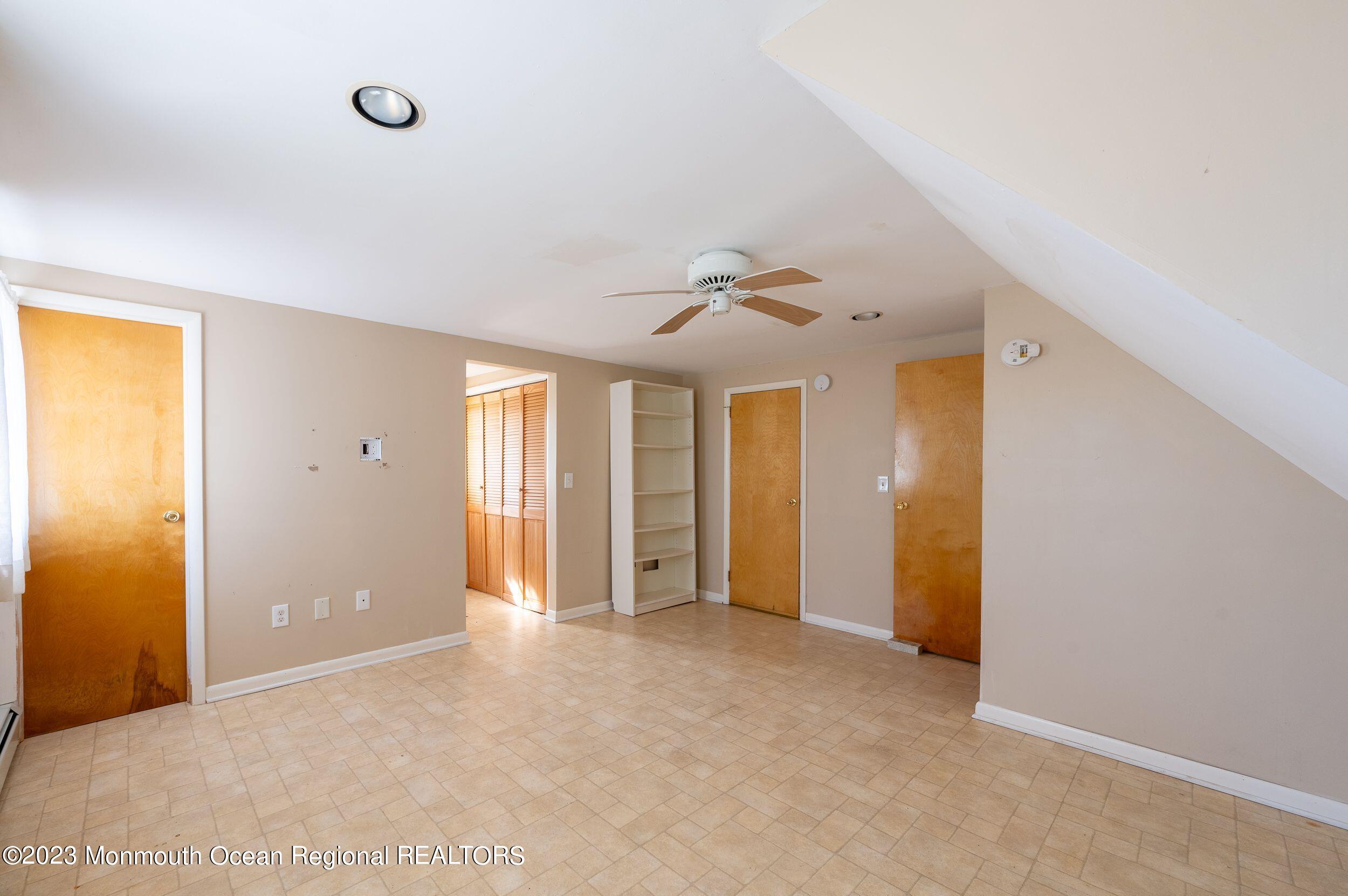 660 Pine Meadow Road Brick, NJ 08724 - Photo 24 of 67 an empty room with windows and closet