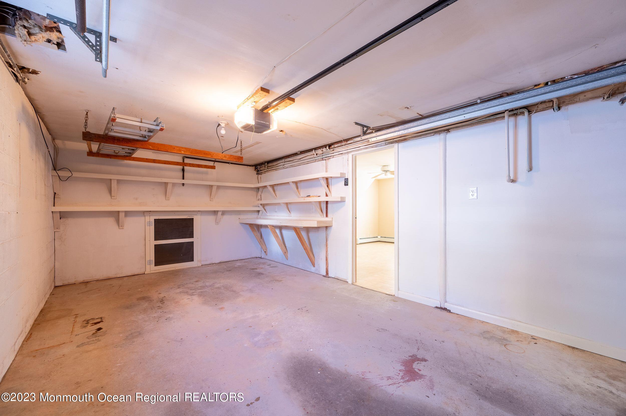 660 Pine Meadow Road Brick, NJ 08724 - Photo 28 of 67 a view of a room with a garage