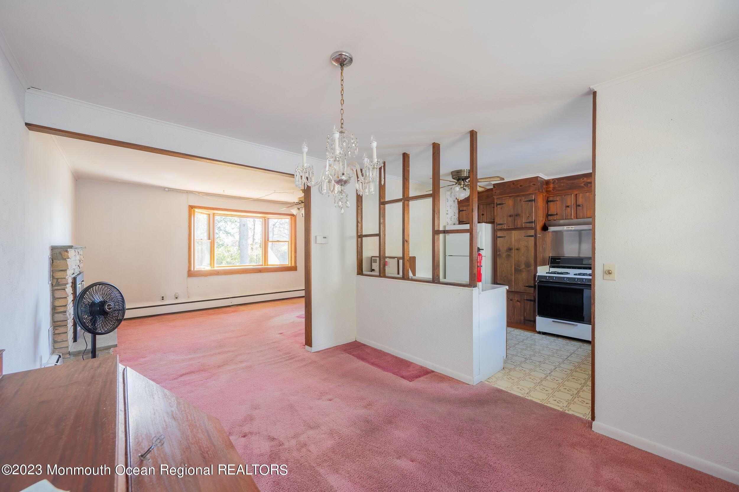 660 Pine Meadow Road Brick, NJ 08724 - Photo 32 of 67 a view of a living room and entryway