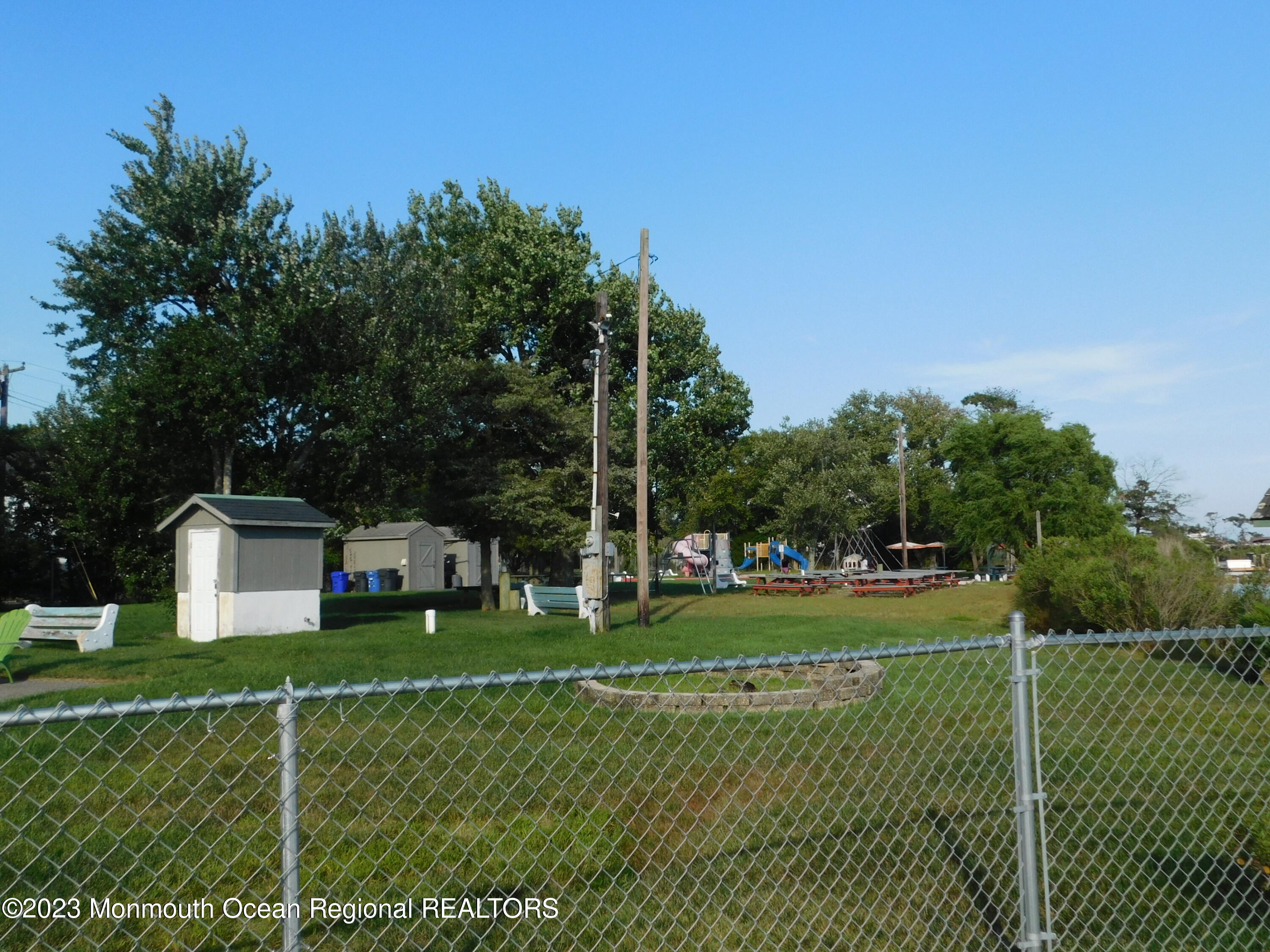 660 Pine Meadow Road Brick, NJ 08724 - Photo 6 of 67 a view of a house with a big yard and potted plants