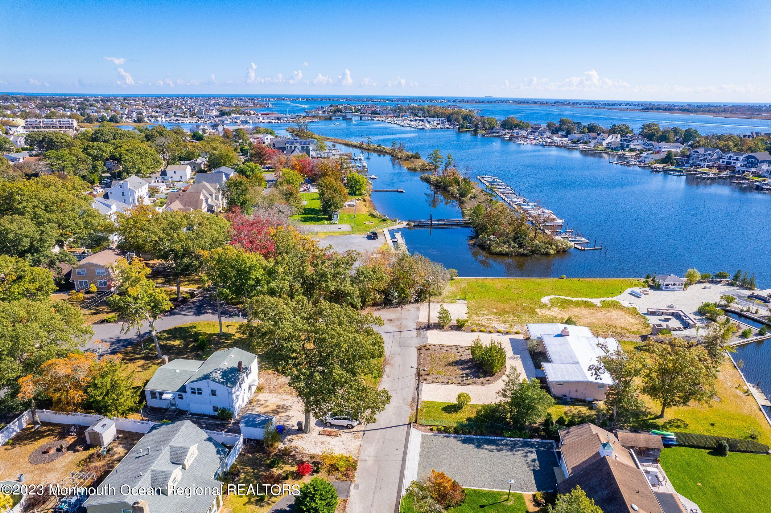 660 Pine Meadow Road Brick, NJ 08724 - Photo 61 of 67 an aerial view of residential building and lake