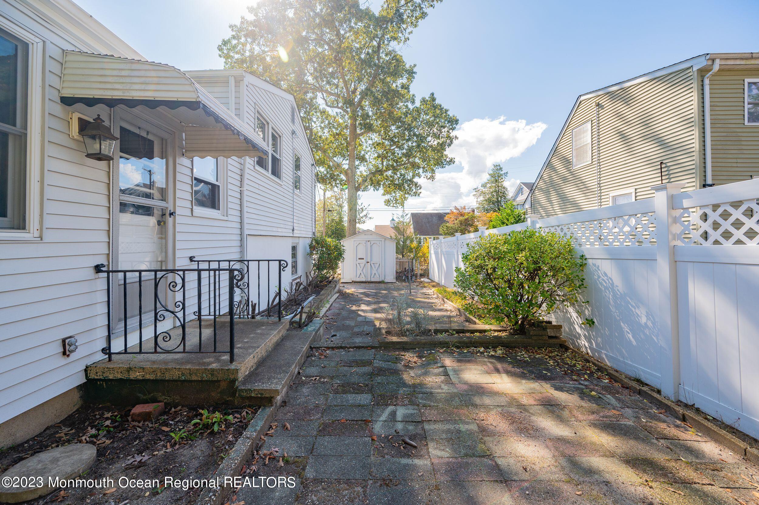 660 Pine Meadow Road Brick, NJ 08724 - Photo 66 of 67 a view of a house with a yard