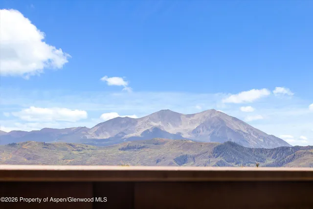 a view of a lake with a mountain