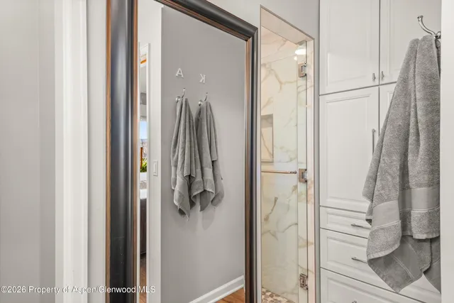 a bedroom with a bed and furniture