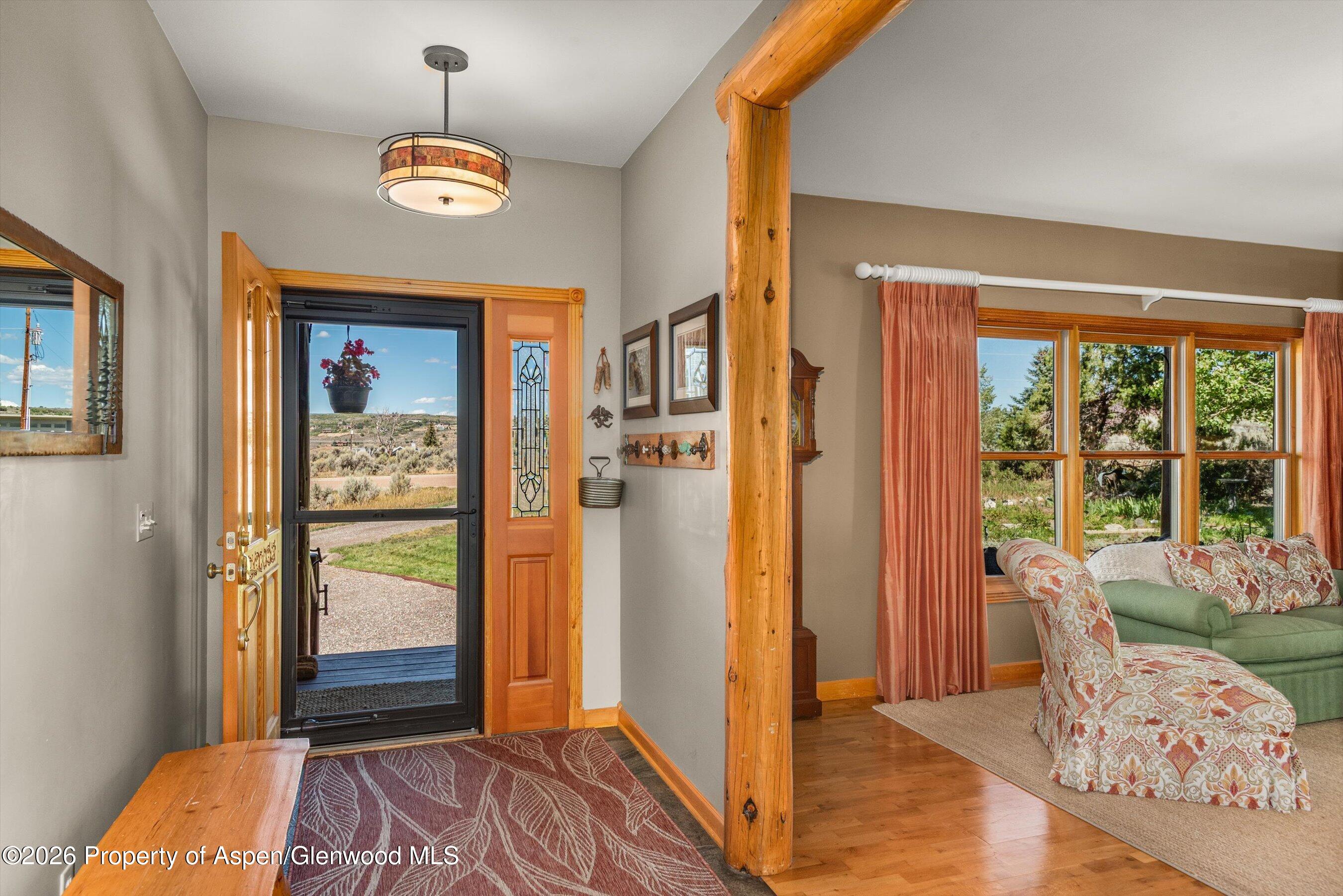 614 Escalante Road Carbondale, CO 81623 - Photo 6 of 46 a bedroom with a bed and a window