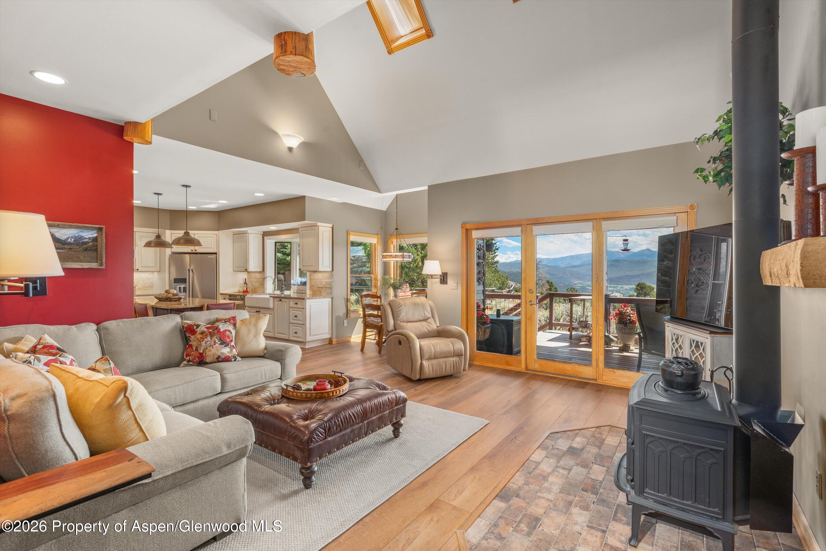 614 Escalante Road Carbondale, CO 81623 - Photo 10 of 46 a living room with furniture and a flat screen tv