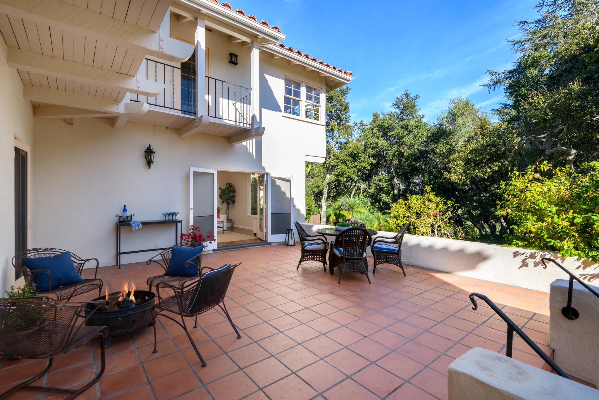 937 Arcady Road Santa Barbara, CA 93108 - Photo 11 of 31 a view of a patio with couches table and chairs and potted plants