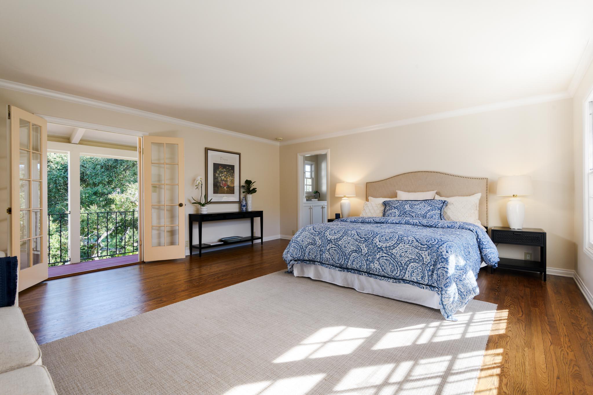 937 Arcady Road Santa Barbara, CA 93108 - Photo 13 of 31 a bedroom with a large bed and a large window