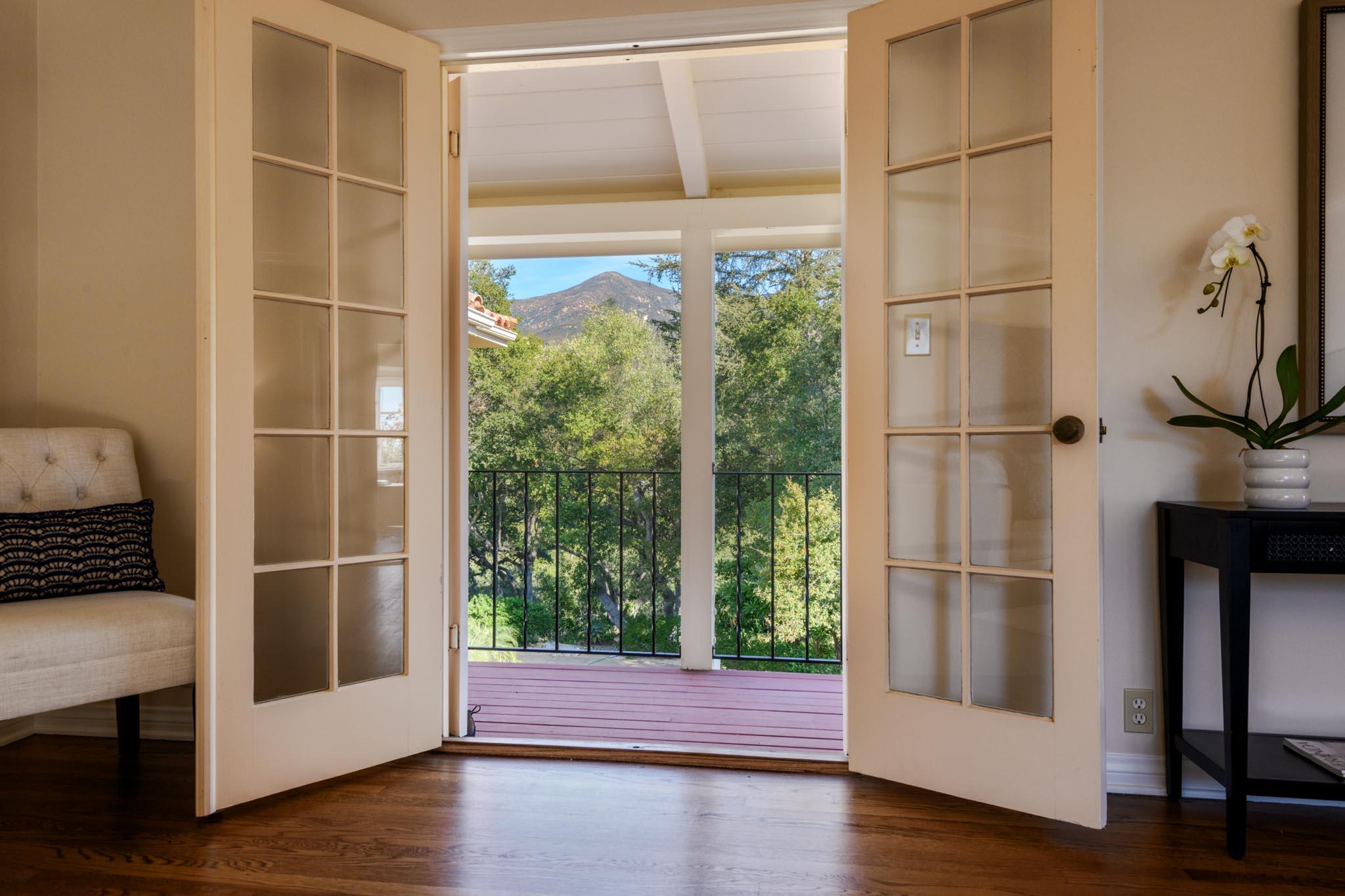 937 Arcady Road Santa Barbara, CA 93108 - Photo 14 of 31 a view of wooden floor and windows in a room