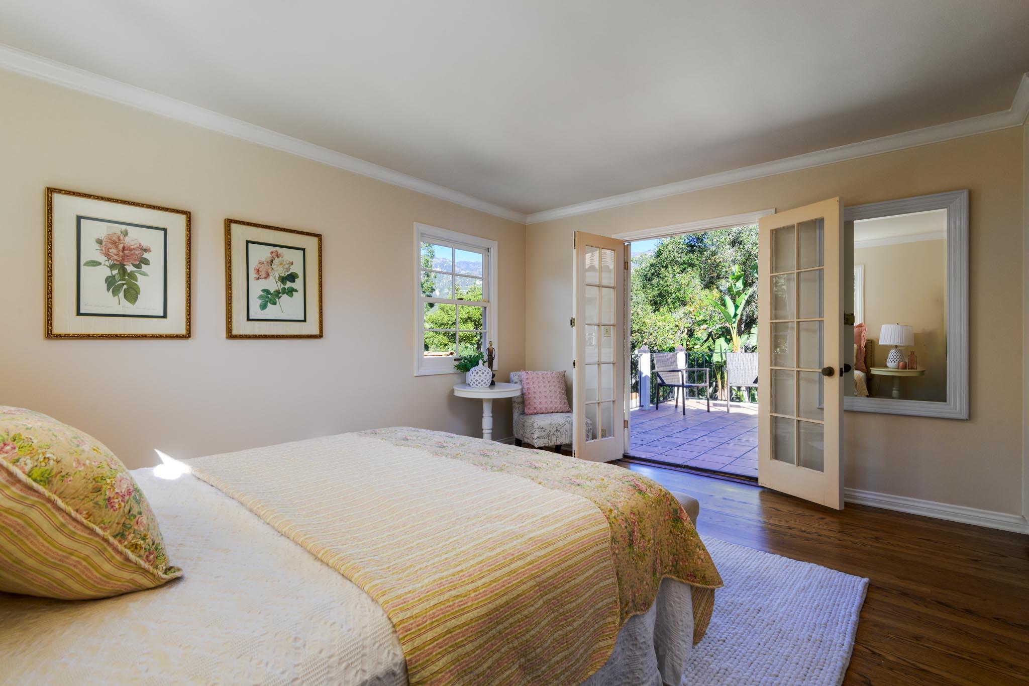 937 Arcady Road Santa Barbara, CA 93108 - Photo 17 of 31 a bedroom with a large bed and a window