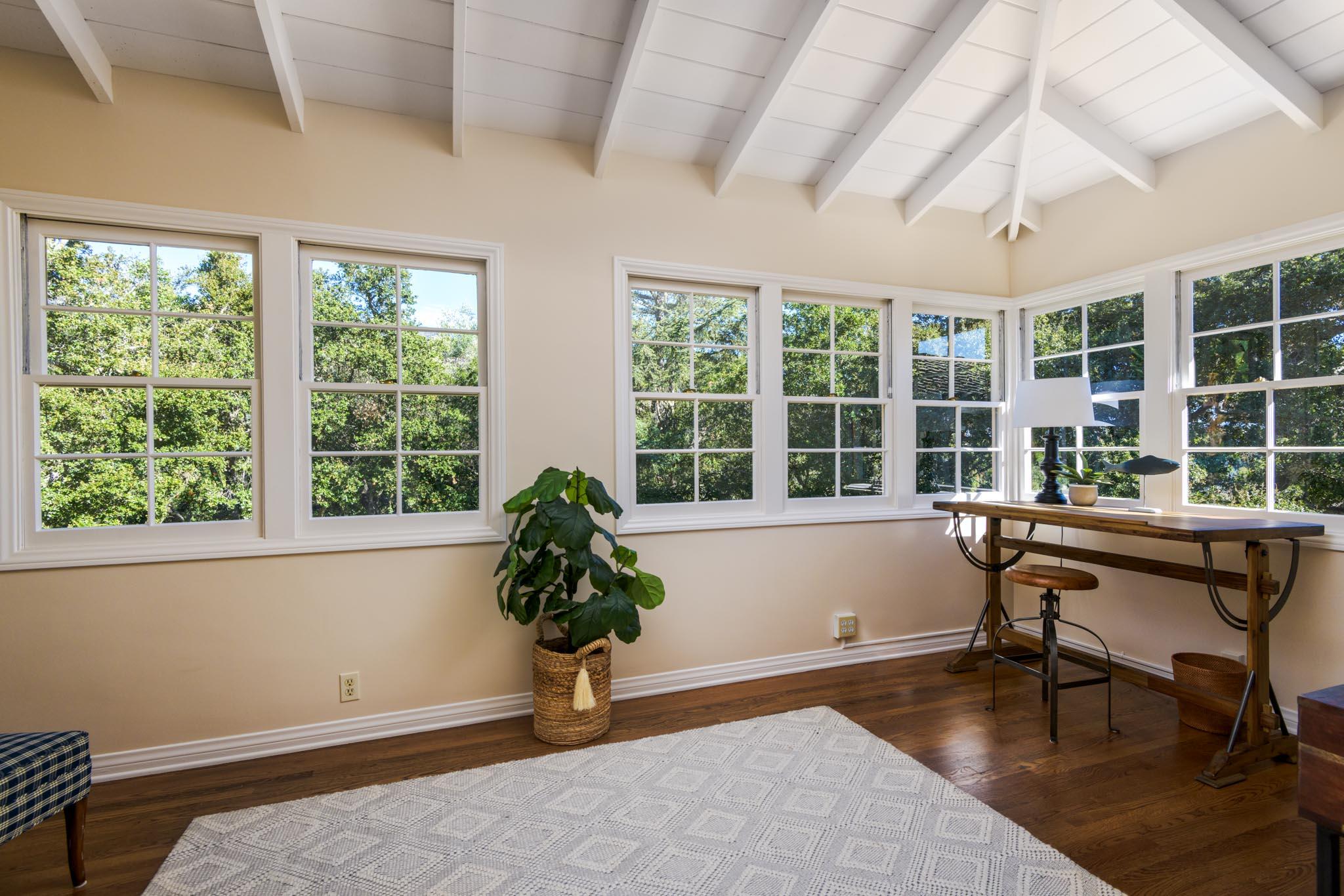 937 Arcady Road Santa Barbara, CA 93108 - Photo 20 of 31 a living room filled with furniture and a potted plant