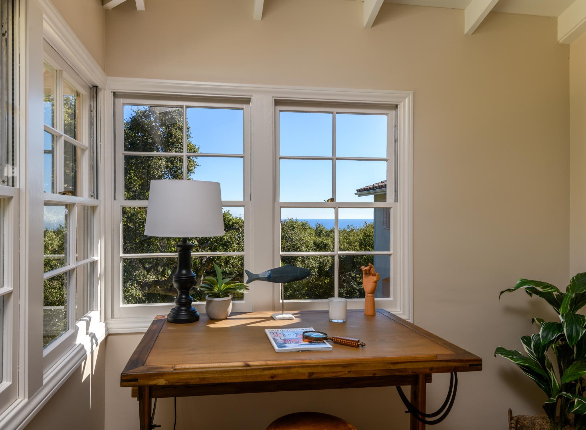 937 Arcady Road Santa Barbara, CA 93108 - Photo 21 of 31 a view of a workspace with a table and chair in a room