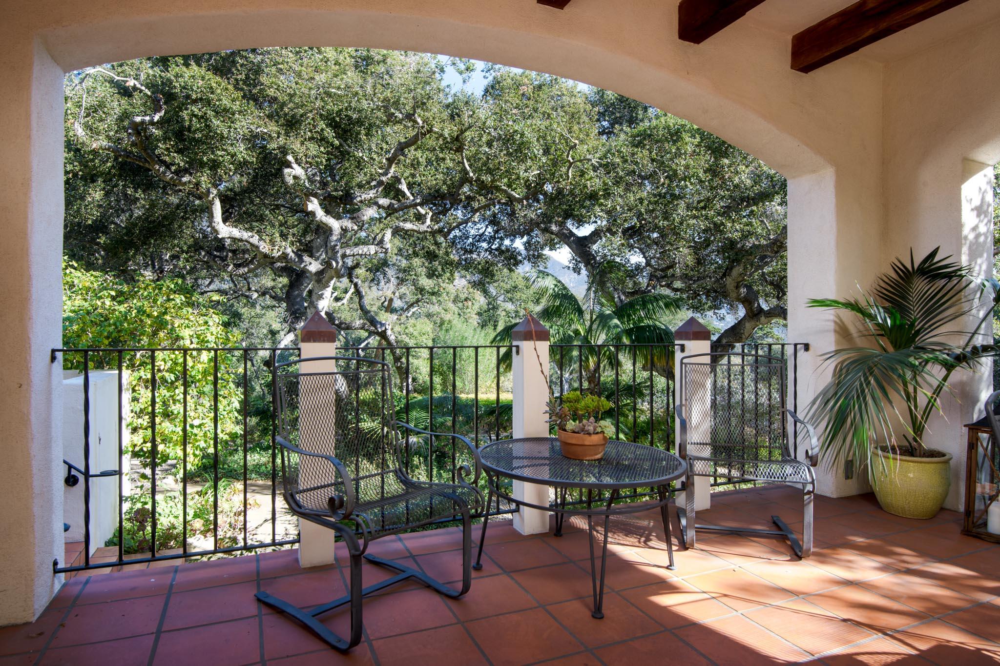 937 Arcady Road Santa Barbara, CA 93108 - Photo 6 of 31 a backyard of a house with table and chairs
