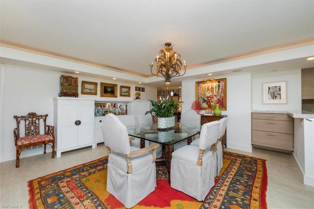 107 Clubhouse Lane, Unit 391 Naples, FL 34105 - Photo 11 of 37 a dining room with furniture and window