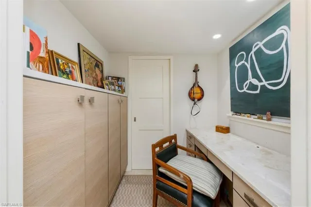 a living room with furniture and window