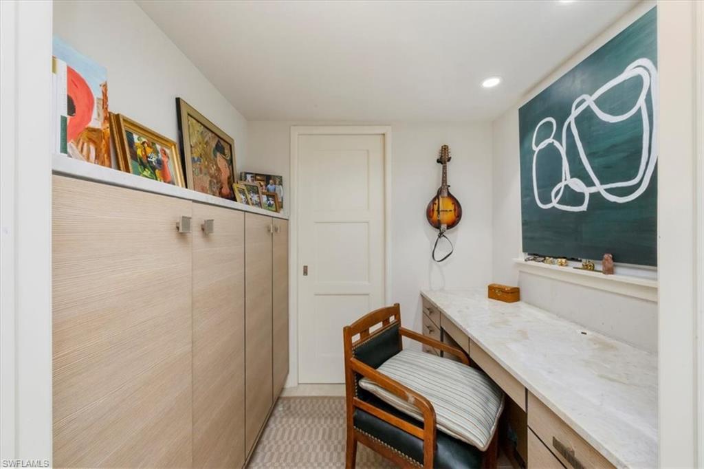 107 Clubhouse Lane, Unit 391 Naples, FL 34105 - Photo 20 of 37 a living room with furniture and window