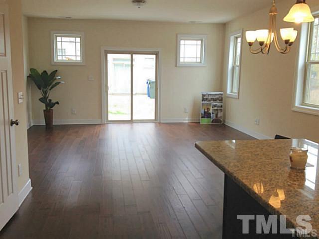 3950 Amelia Park Drive Raleigh, NC 27606 - Photo 8 of 20 a view of livingroom with furniture and wooden floor