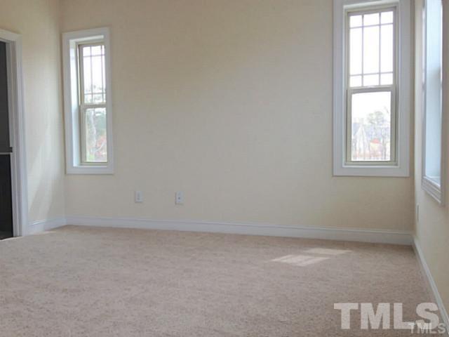 3950 Amelia Park Drive Raleigh, NC 27606 - Photo 10 of 20 an empty room with windows