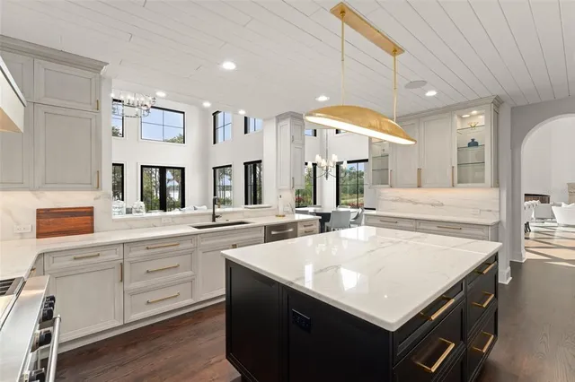 a kitchen with a stove and a sink