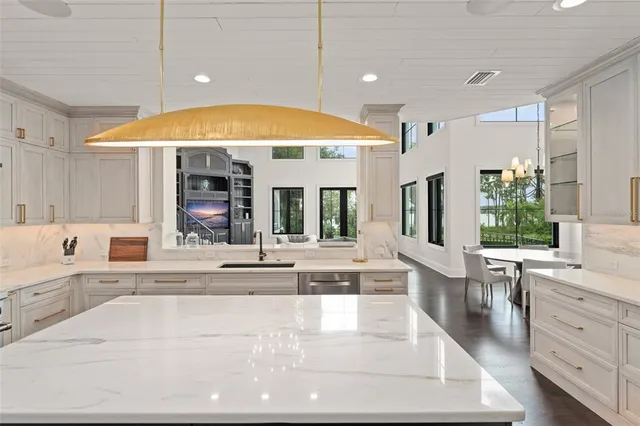 a kitchen with a stove and a sink