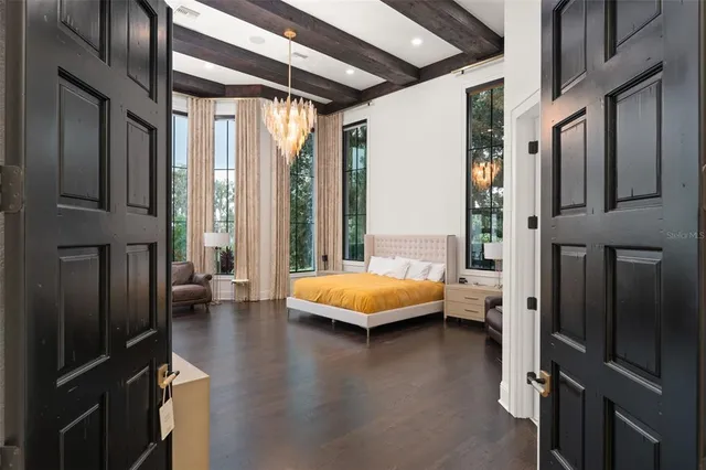 a bathroom with a double vanity sink and mirror