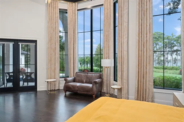 a view of a black and white wall with a window