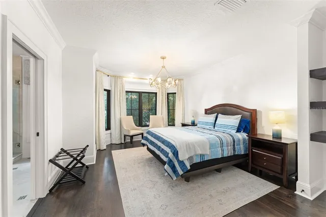 a bathroom with a sink a double vanity and shower