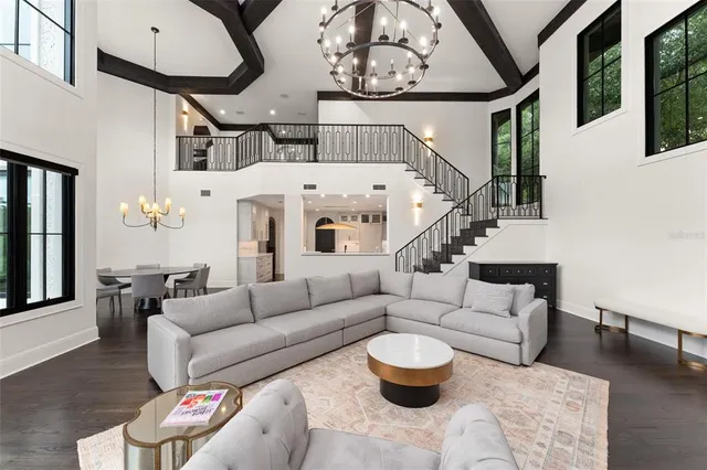 a view of a swimming pool with a patio and a garden