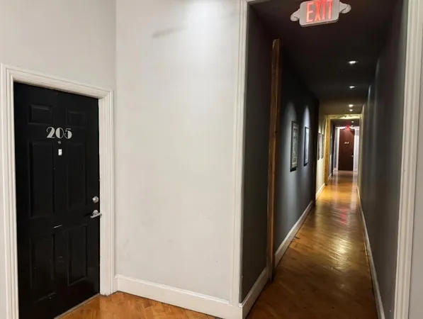a bathroom with a bathtub and a sink
