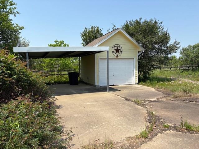 31205 Hegar Road Hockley, TX 77447 - Photo 4 of 17 a front view of a house with a yard and garage