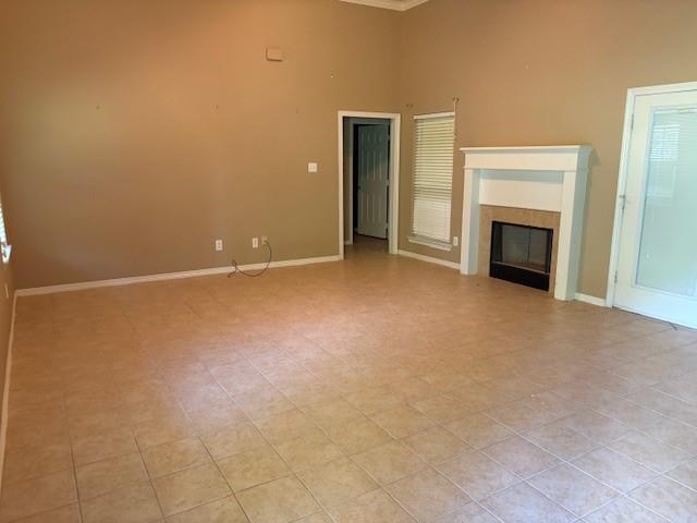 31205 Hegar Road Hockley, TX 77447 - Photo 5 of 17 a view of an empty room with a fireplace