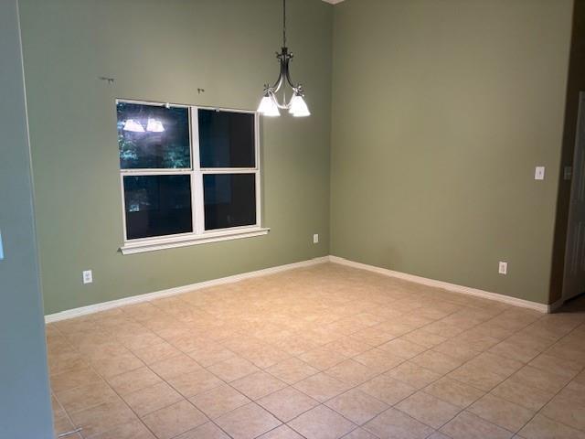 31205 Hegar Road Hockley, TX 77447 - Photo 6 of 17 a view of an empty room with a window