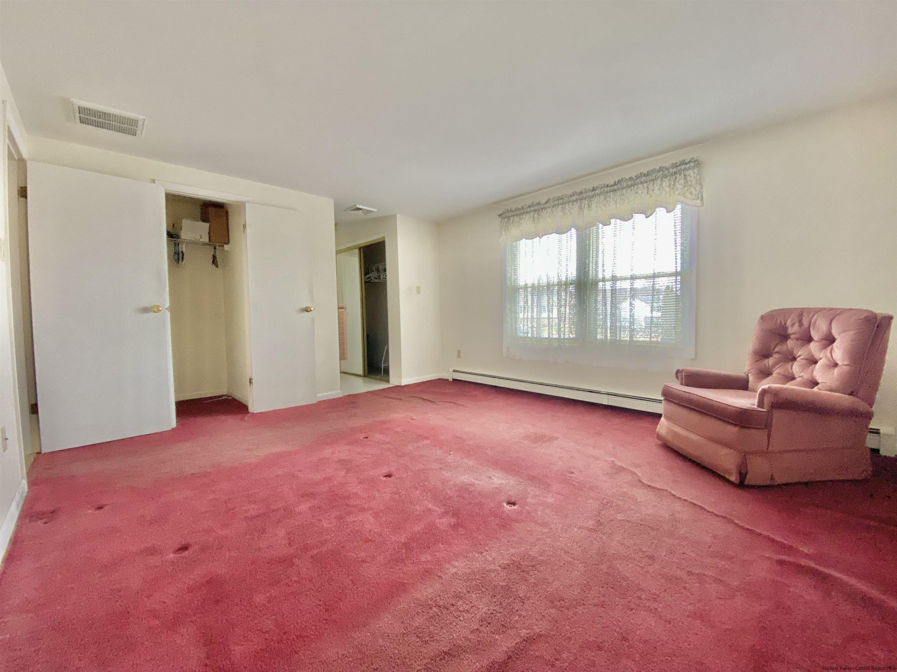 8 Pawan Circle Lake Katrine, NY 12449 - Photo 16 of 28 a living room with furniture and a window