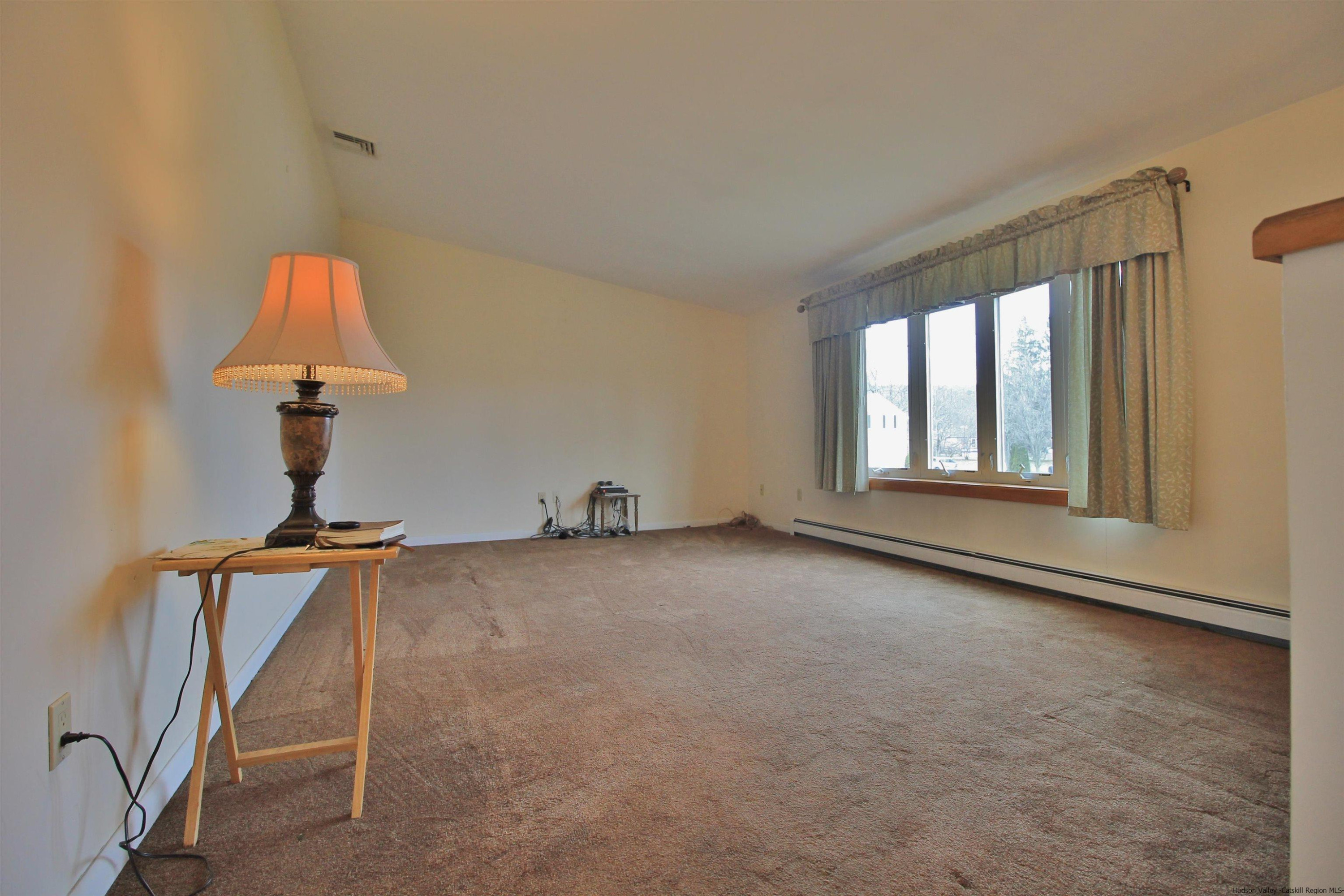 8 Pawan Circle Lake Katrine, NY 12449 - Photo 4 of 28 an empty room with windows