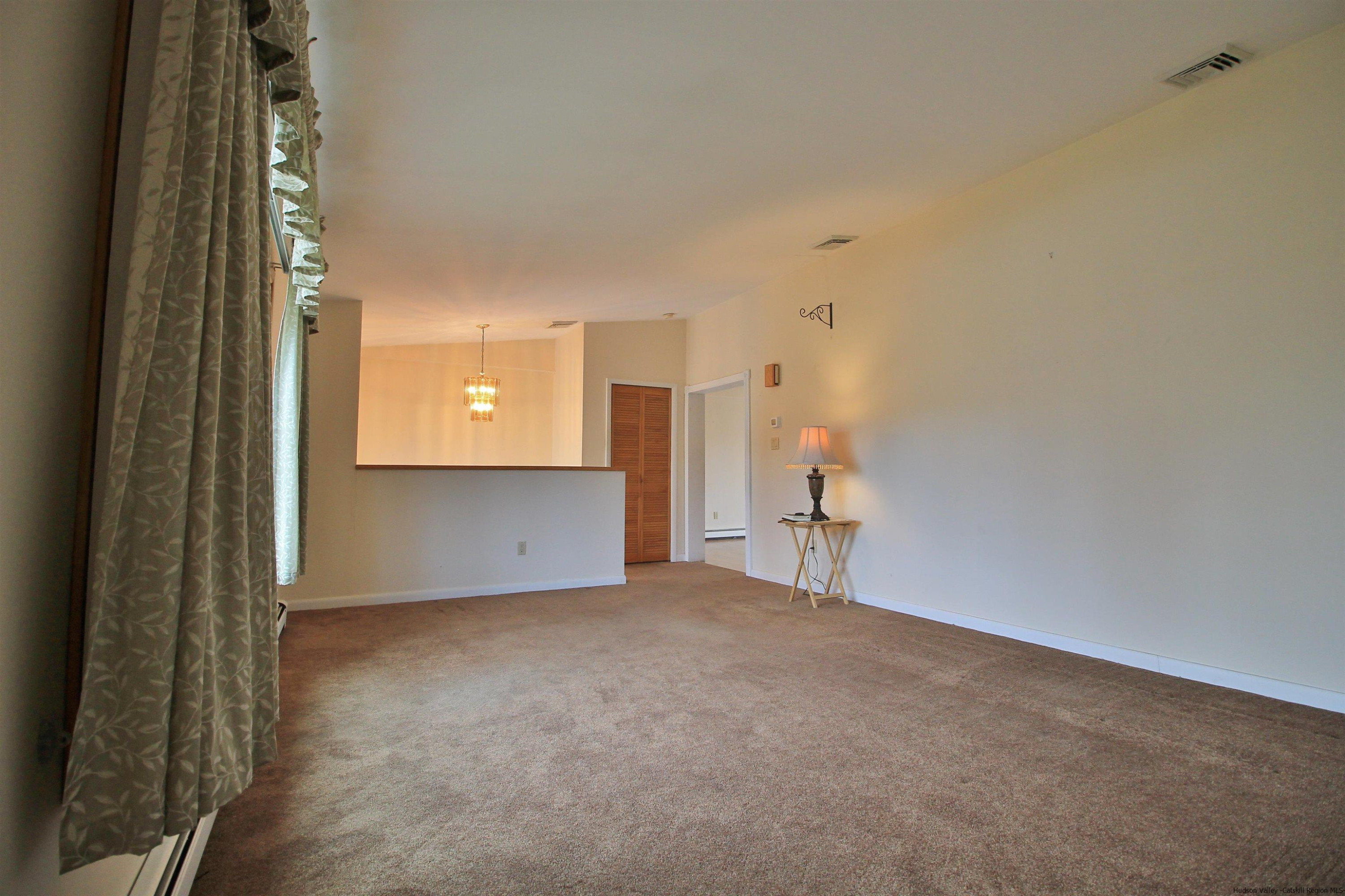 8 Pawan Circle Lake Katrine, NY 12449 - Photo 6 of 28 a view of empty room with a fireplace