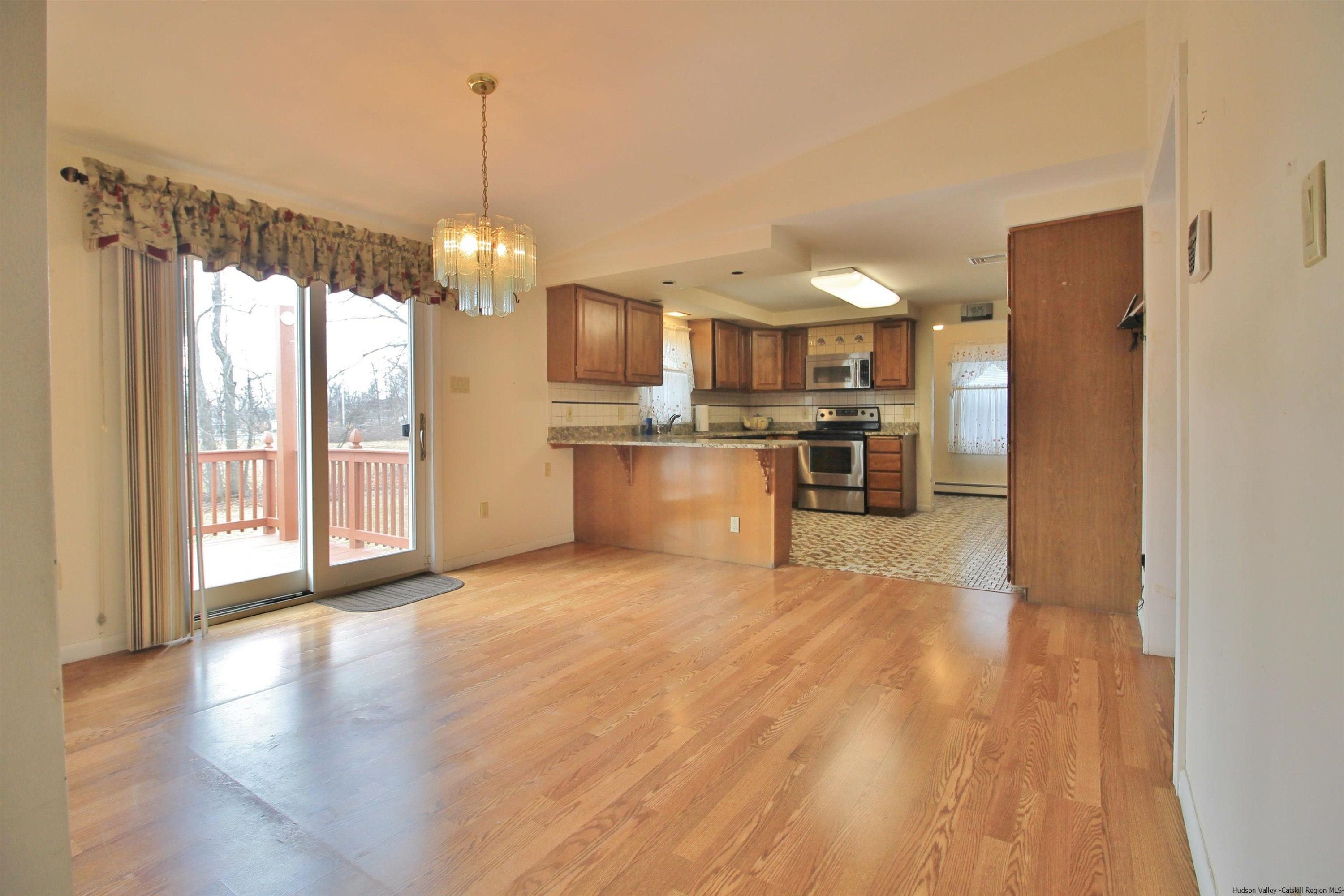 8 Pawan Circle Lake Katrine, NY 12449 - Photo 10 of 28 a view of a kitchen with a stove wooden floor and a kitchen