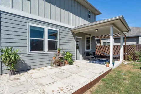 a front view of a house with patio