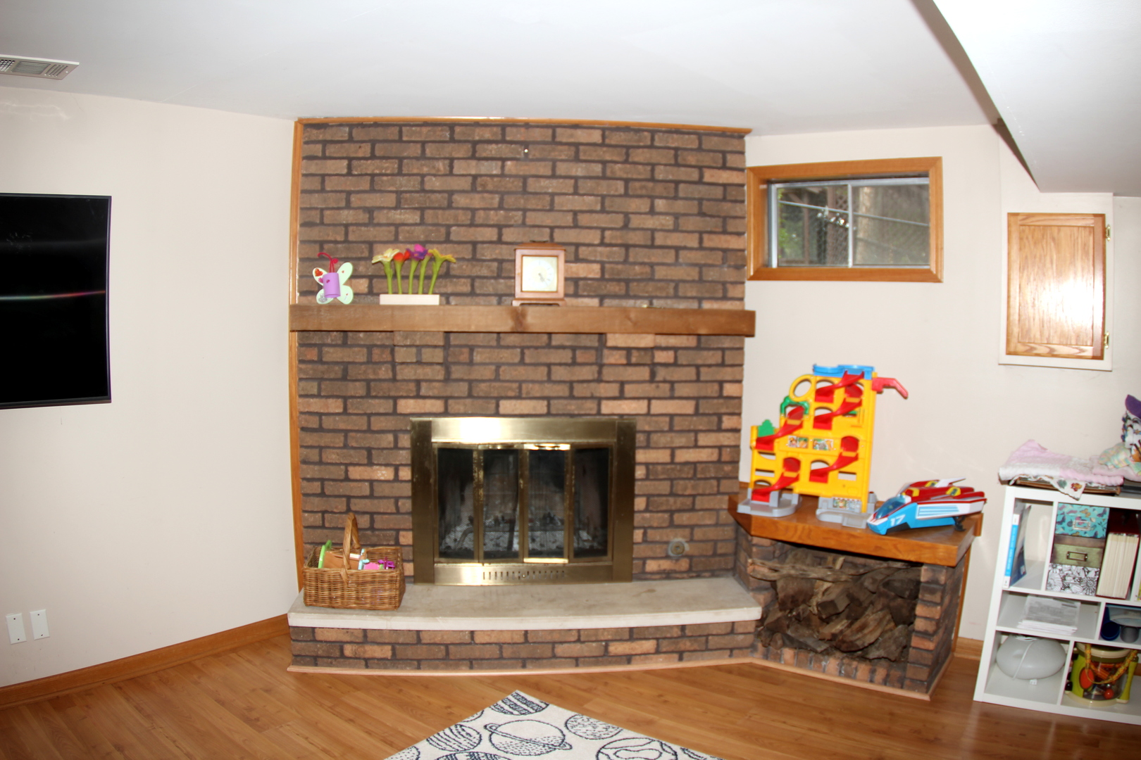 260 Thomas Street Cary, IL 60013 - Photo 11 of 16 a living room with furniture and a fireplace
