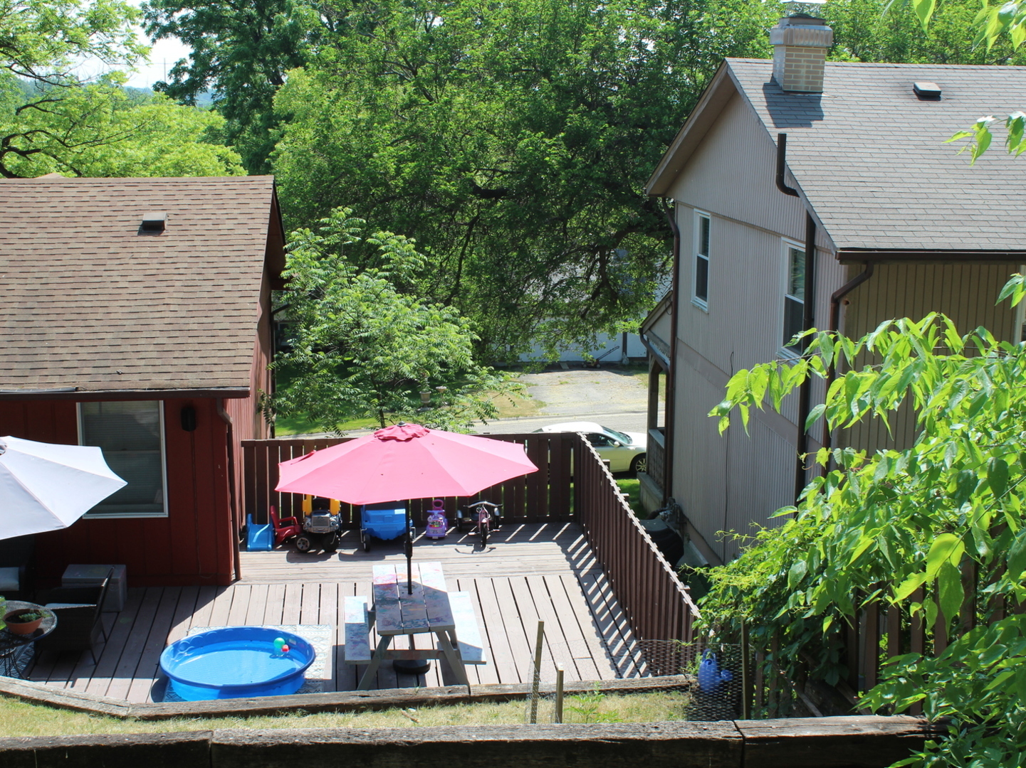 260 Thomas Street Cary, IL 60013 - Photo 2 of 16 a view of a patio with table and chairs potted plants