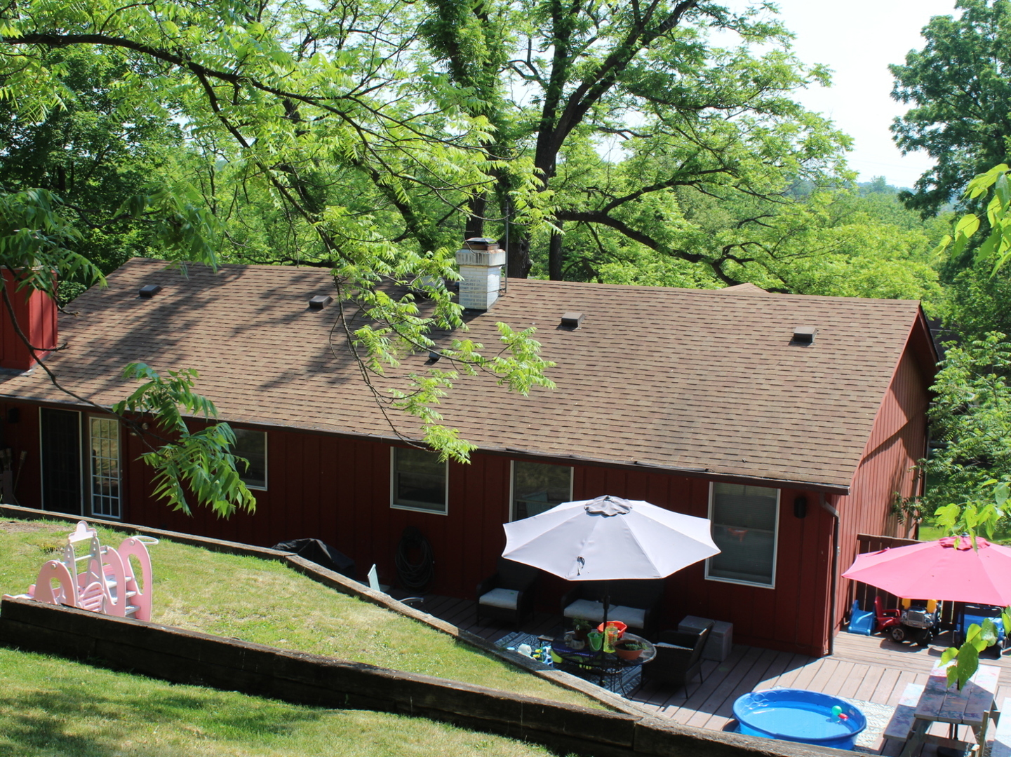 260 Thomas Street Cary, IL 60013 - Photo 3 of 16 a backyard of a house with yard table and chairs