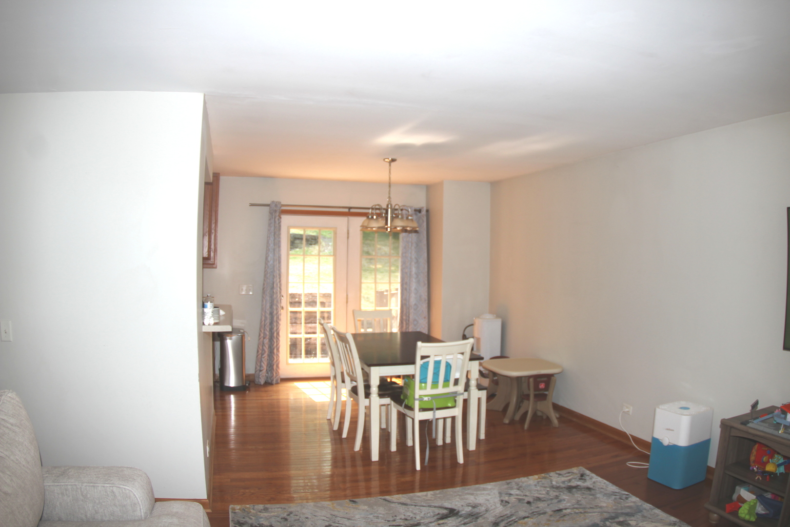 260 Thomas Street Cary, IL 60013 - Photo 6 of 16 a view of a dining room with furniture and wooden floor